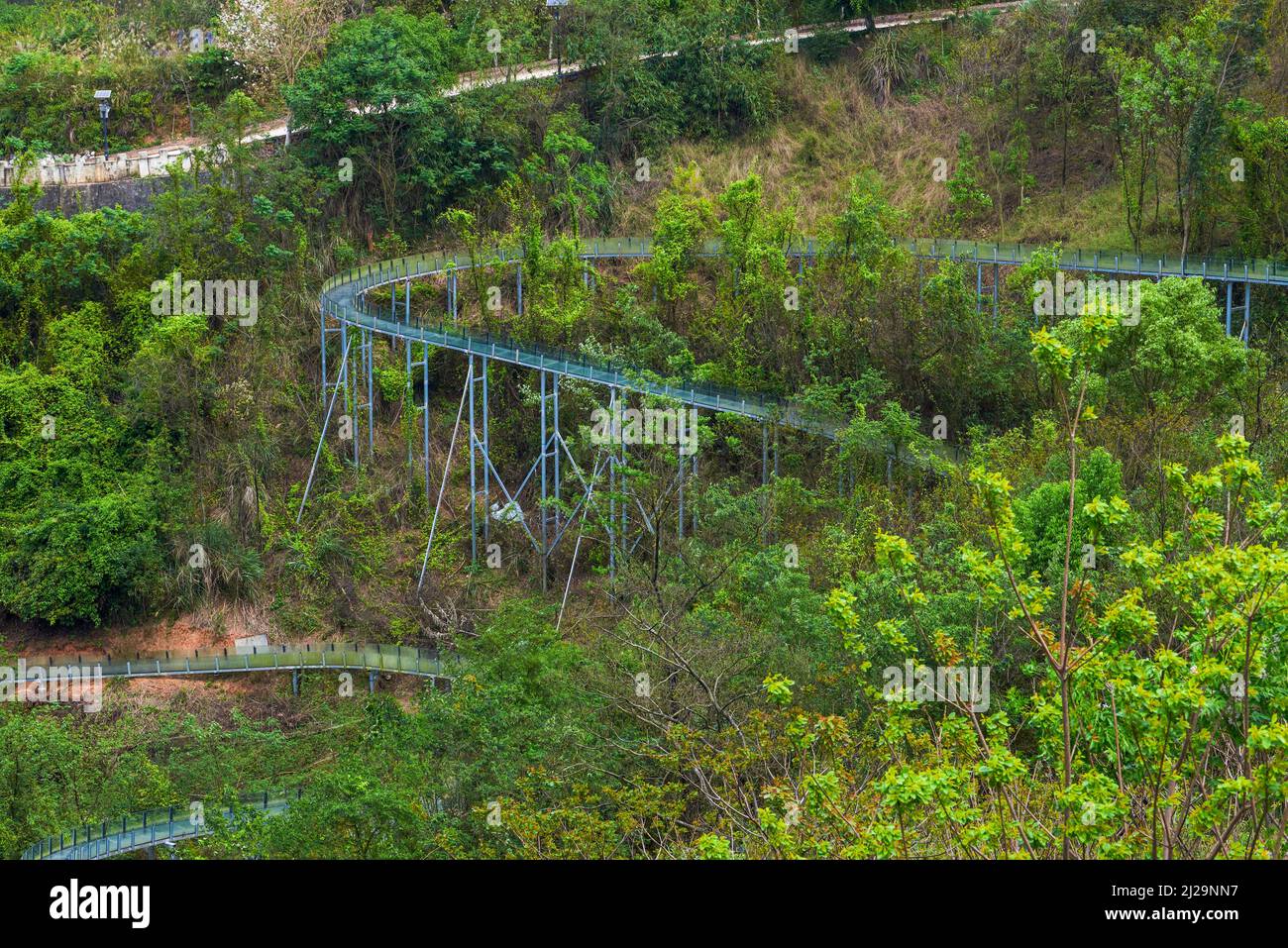 Rides on the glass slide on the hillside Stock Photo Alamy