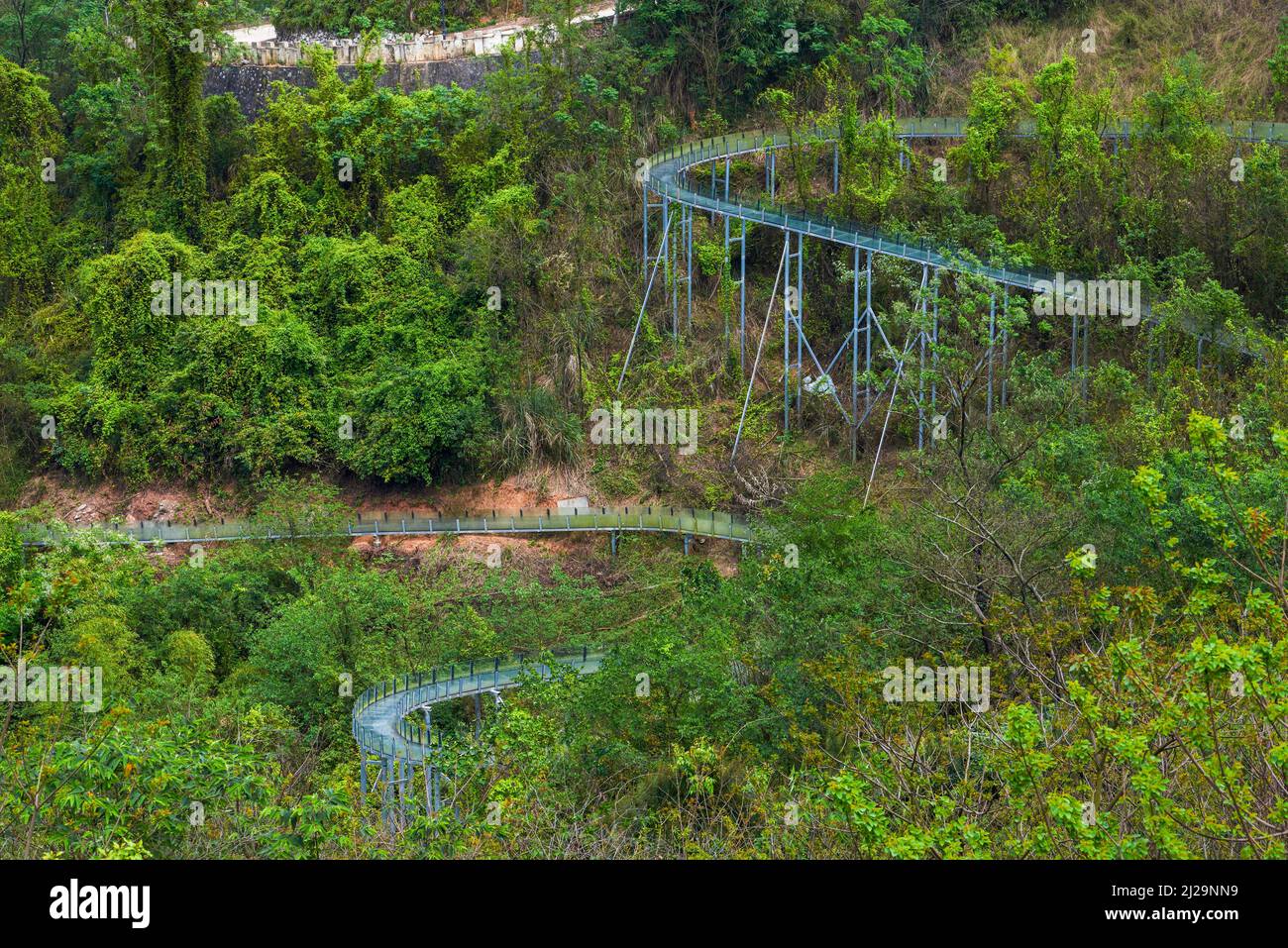 Rides on the glass slide on the hillside Stock Photo Alamy