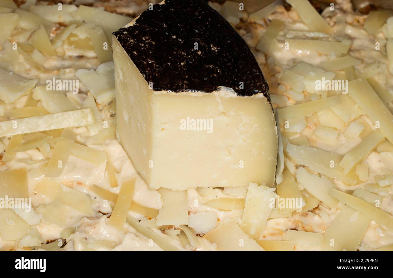 Sardinian pecorino, cheese shaved on a lasagne Stock Photo Alamy