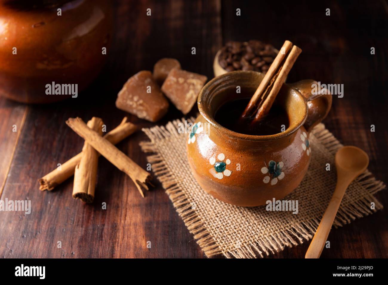 Cafe de Olla. Traditional Mexican coffee and basic ingredients for its preparation, coffee