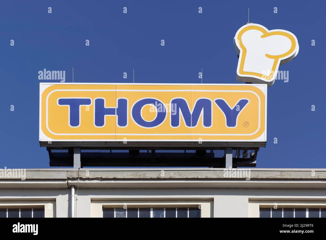 Thomy, logo with chef's hat, at the factory for delicatessen products, Nestle Deutschland AG, Neuss, North Rhine-Westphalia, Germany Stock Photo