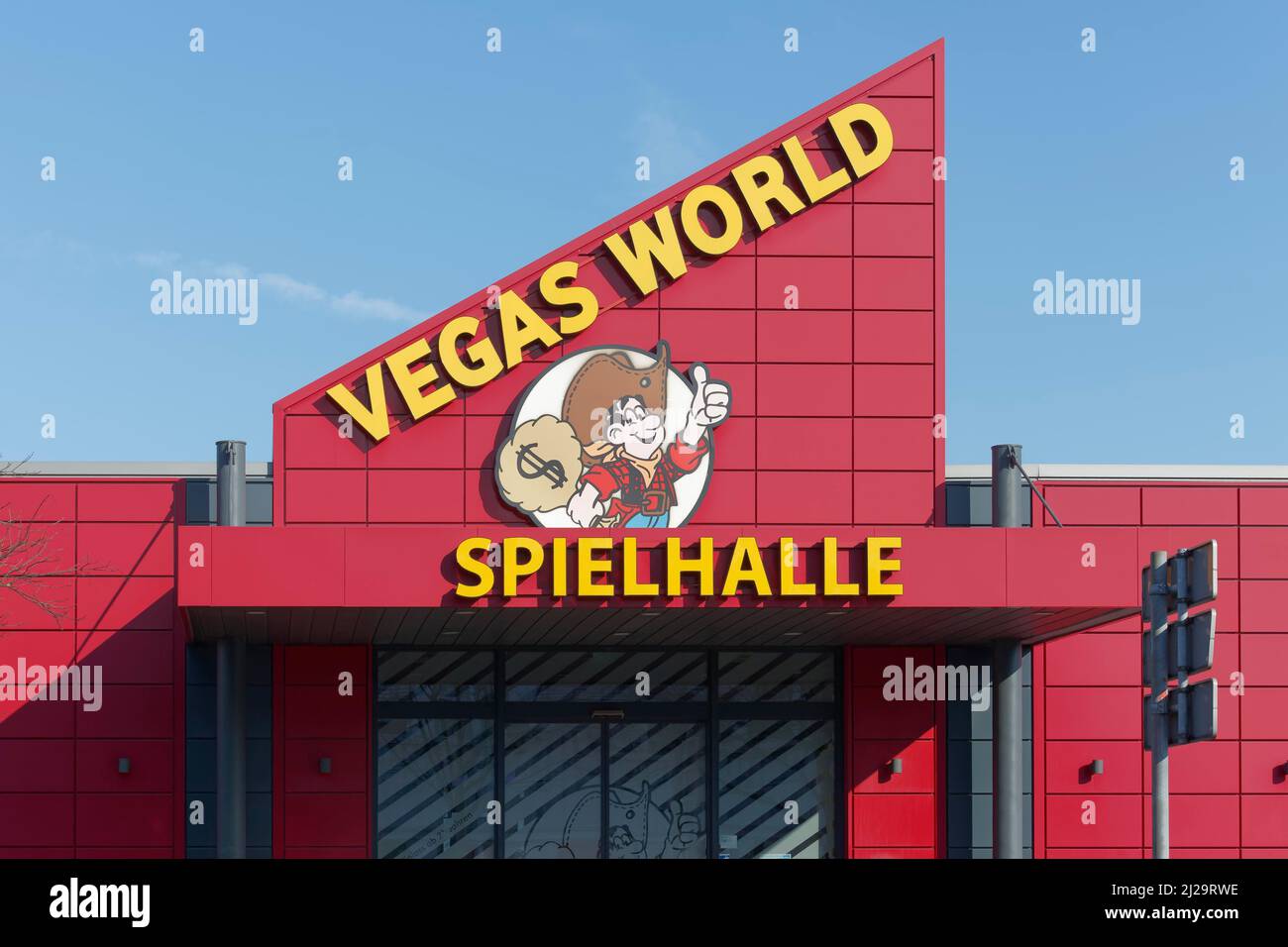 Vegas World arcade, logo with drawn cowboy, casino, Neuss, North Rhine-Westphalia, Germany Stock Photo