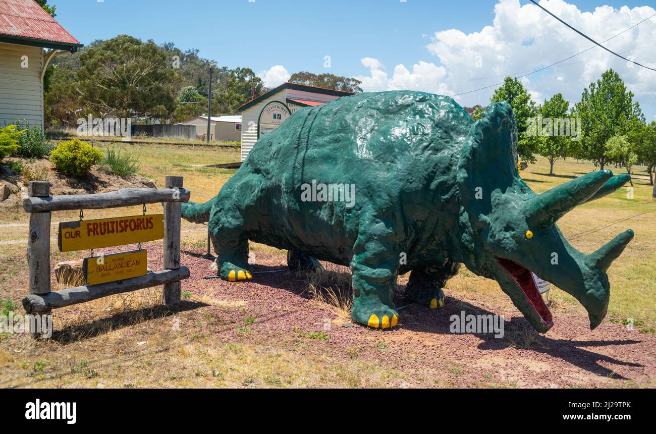 The Balladean railway station is a well-known landmark on the New England Highway due to the big dinosaur in front of it, nicknamed the Fruitisforus. Stock Photo