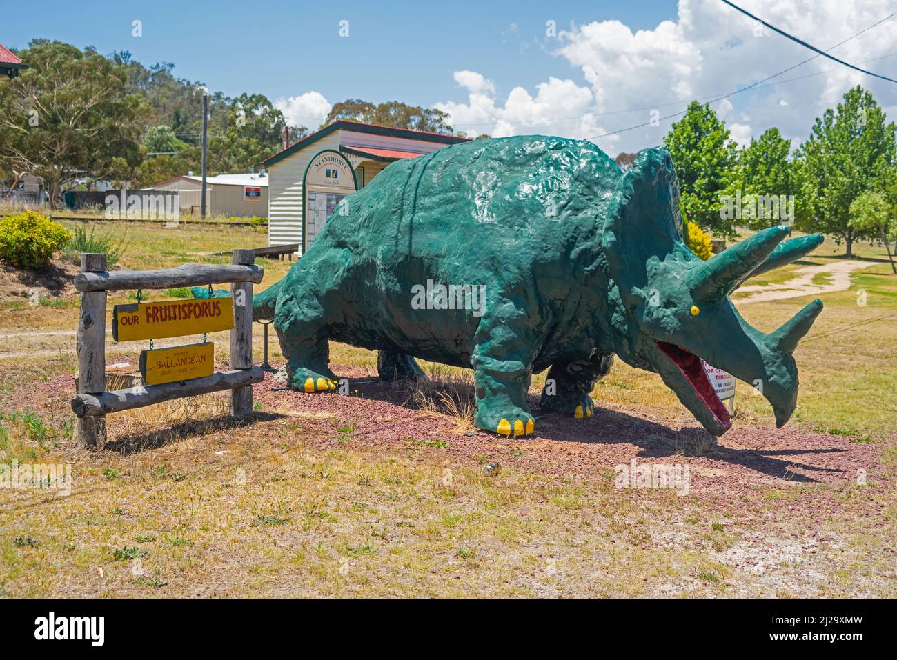 The Balladean railway station is a well-known landmark on the New England Highway due to the big dinosaur in front of it, nicknamed the Fruitisforus. Stock Photo