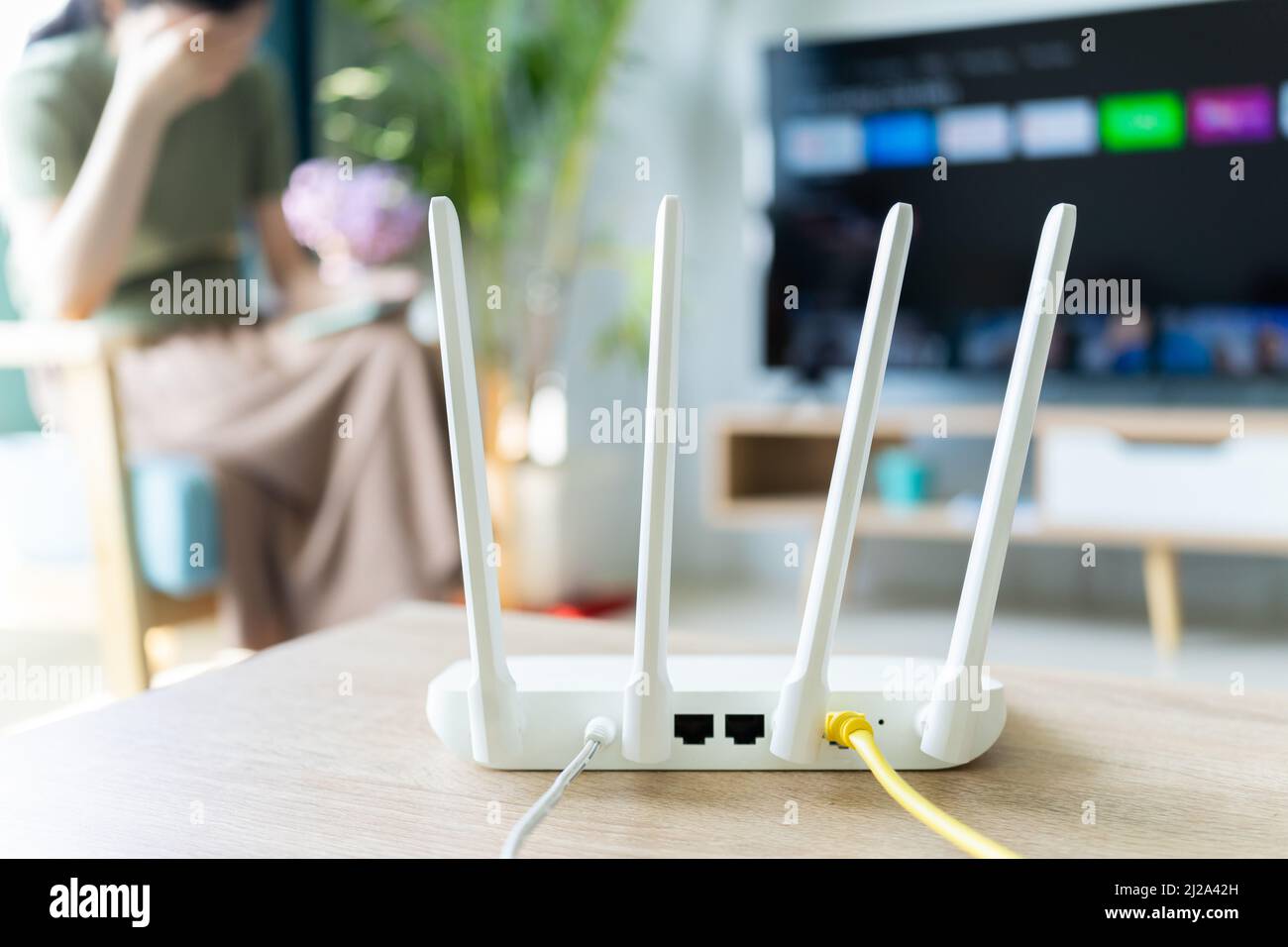 The internet router is placed on the living room table Stock Photo - Alamy