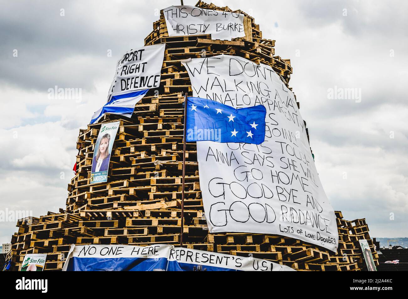 Newtownabbey, Northern Ireland. 11 July 2014 - Bonfires are prepared for burning for 11th July celebrations, many being adorned with election posters from hated politicians, or large banners with political messages. Stock Photo