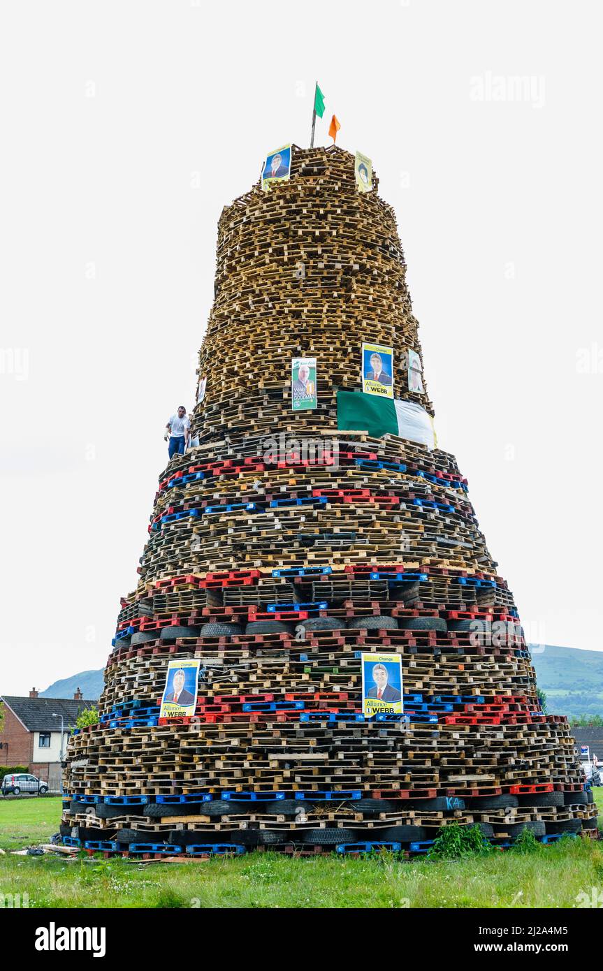 Newtownabbey, Northern Ireland. 11 July 2014 - Bonfires are prepared for burning for 11th July celebrations, many being adorned with election posters from hated politicians, or large banners with political messages. Stock Photo