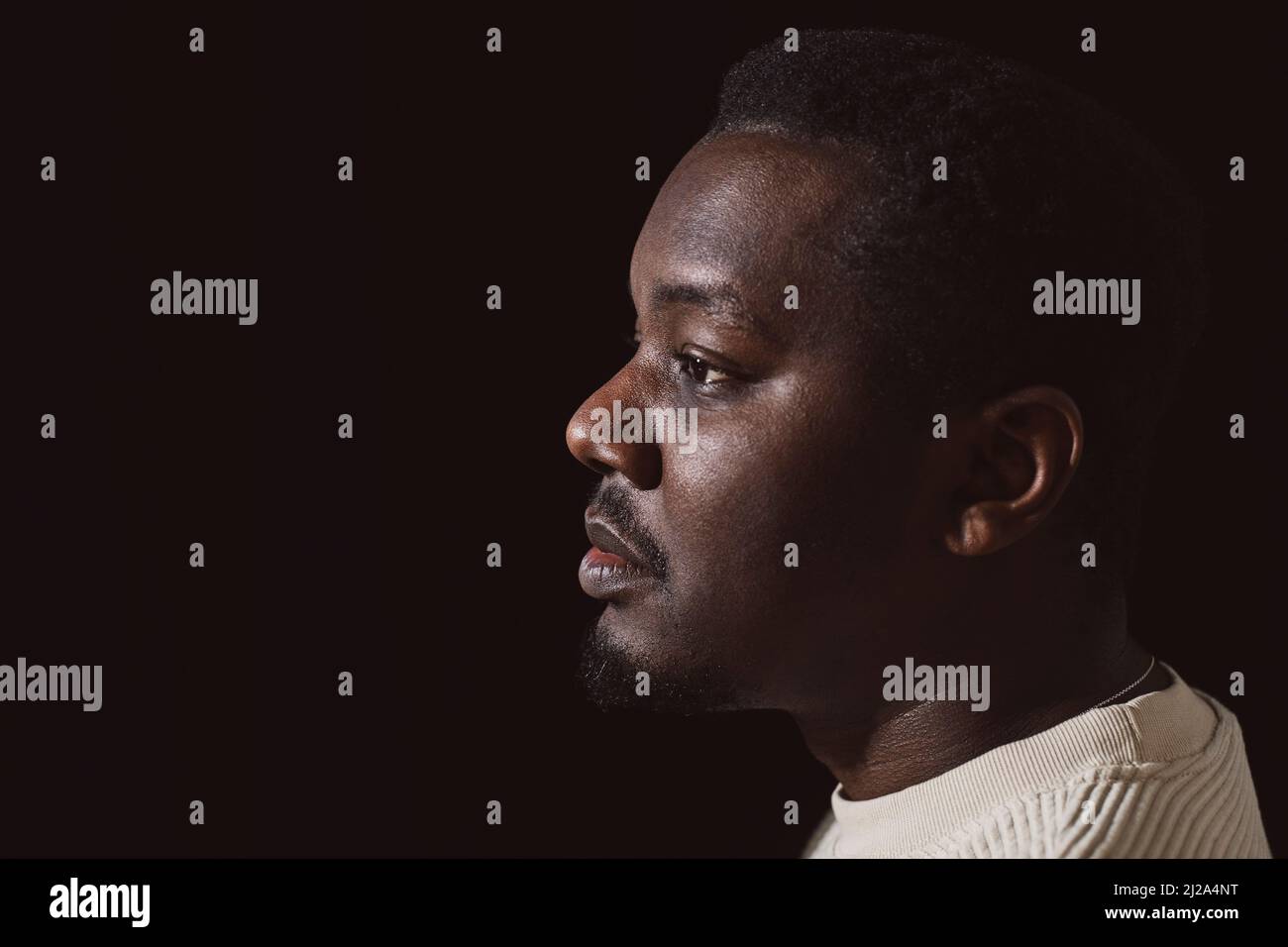 Contemplative black man looking hi-res stock photography and images - Alamy