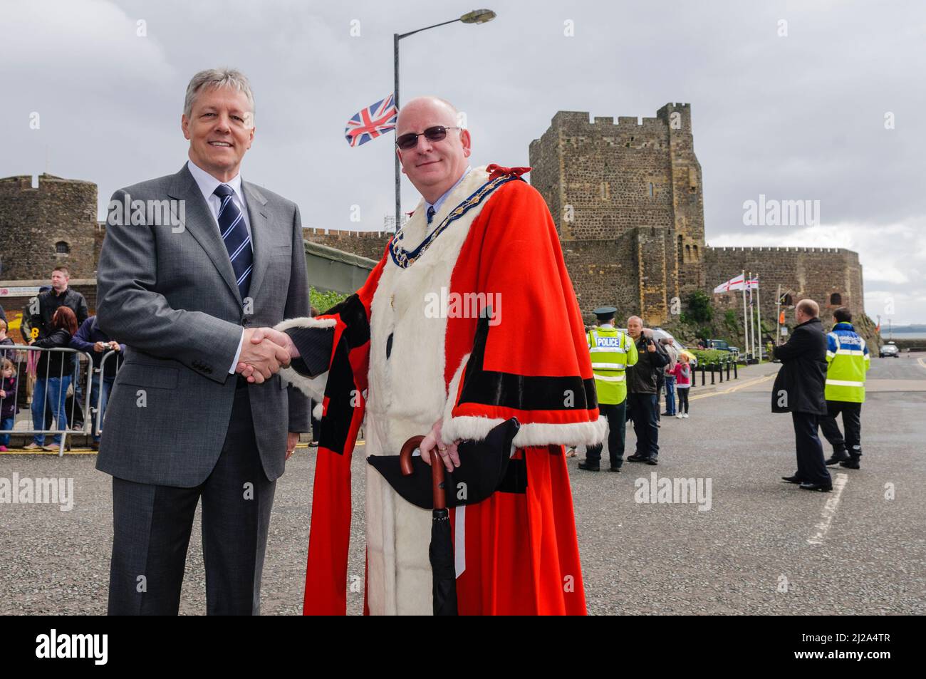 Carrickfergus, 30/06/2012 - Armed Forces Day.  Peter Robinson shakes hands with Mayor for Carrickfergus, Victor Robinson (no relation) Stock Photo