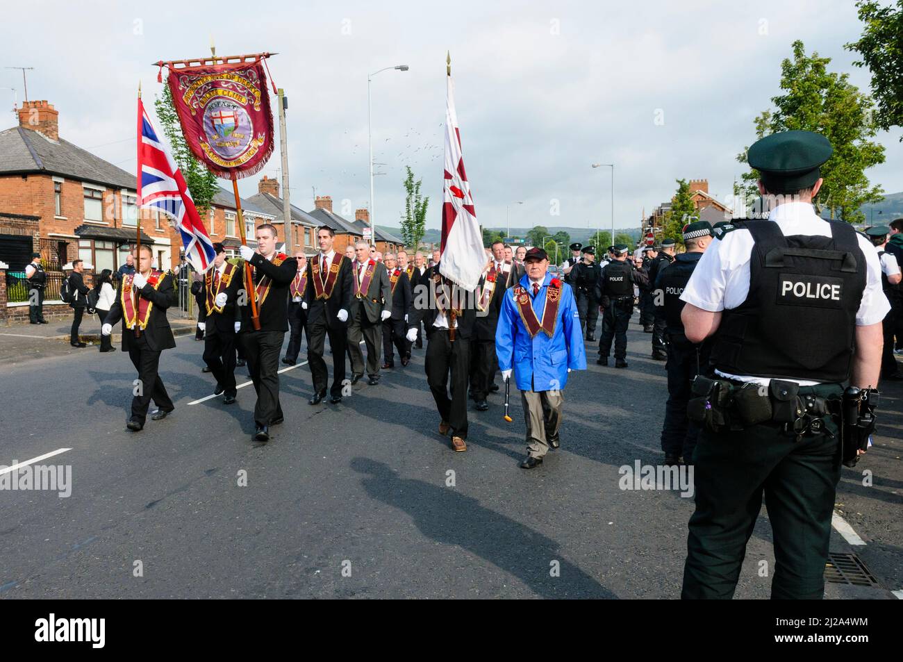 11th August 2012, Belfast.  Apprentice Boys of Derry lodge parade past Ardoyne protesters and a large number of police officers. Stock Photo