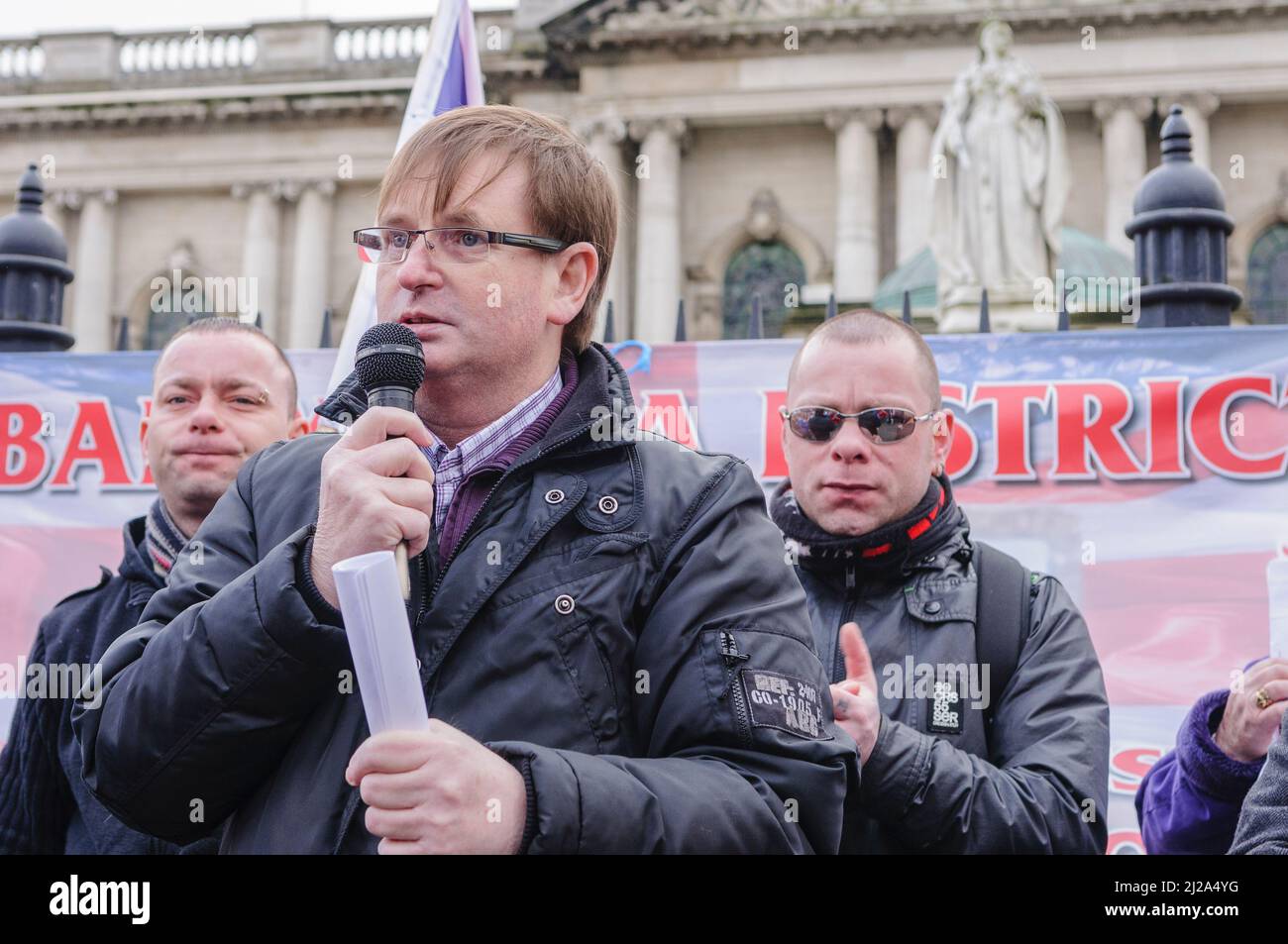 Belfast, Northern Ireland, 16th February 2013.  Willie Frazer addresses the crowd at Belfast City Hall Stock Photo