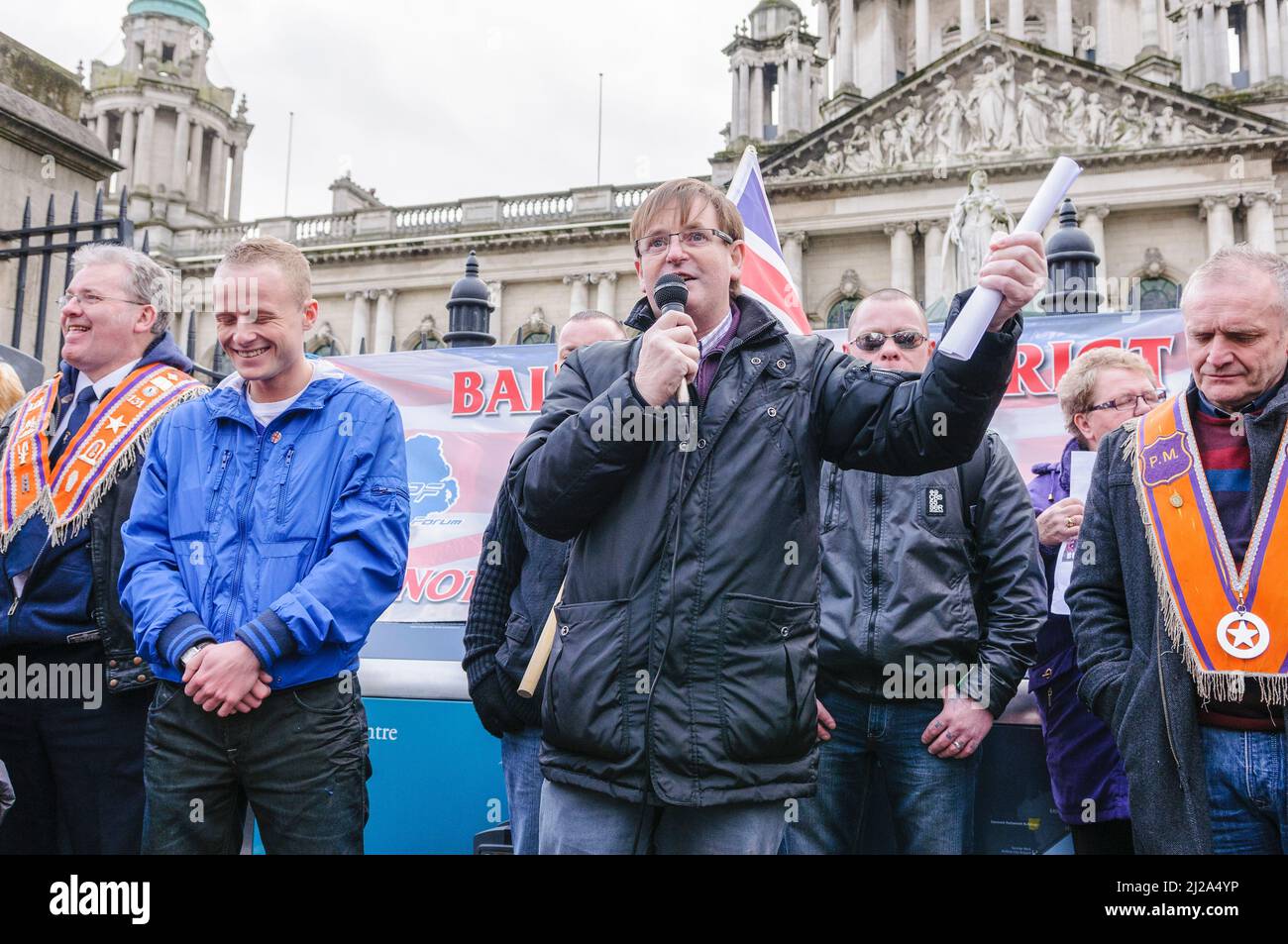 Belfast, Northern Ireland, 16th February 2013.  Willie Frazer addresses the crowd at Belfast City Hall alongside Jamie Bryson. Stock Photo