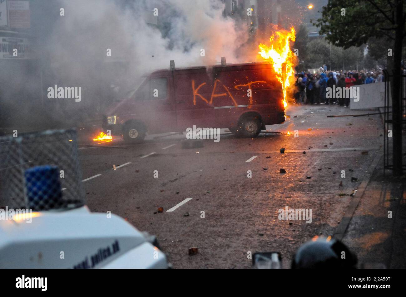 Belfast, Northern Ireland. 9th August 2013 - An anti-Internment parade by republicans sparks riots by protesting loyalists in Belfast.  A van has KAT (Kill all Taigs) written in spray paint on the side. Stock Photo