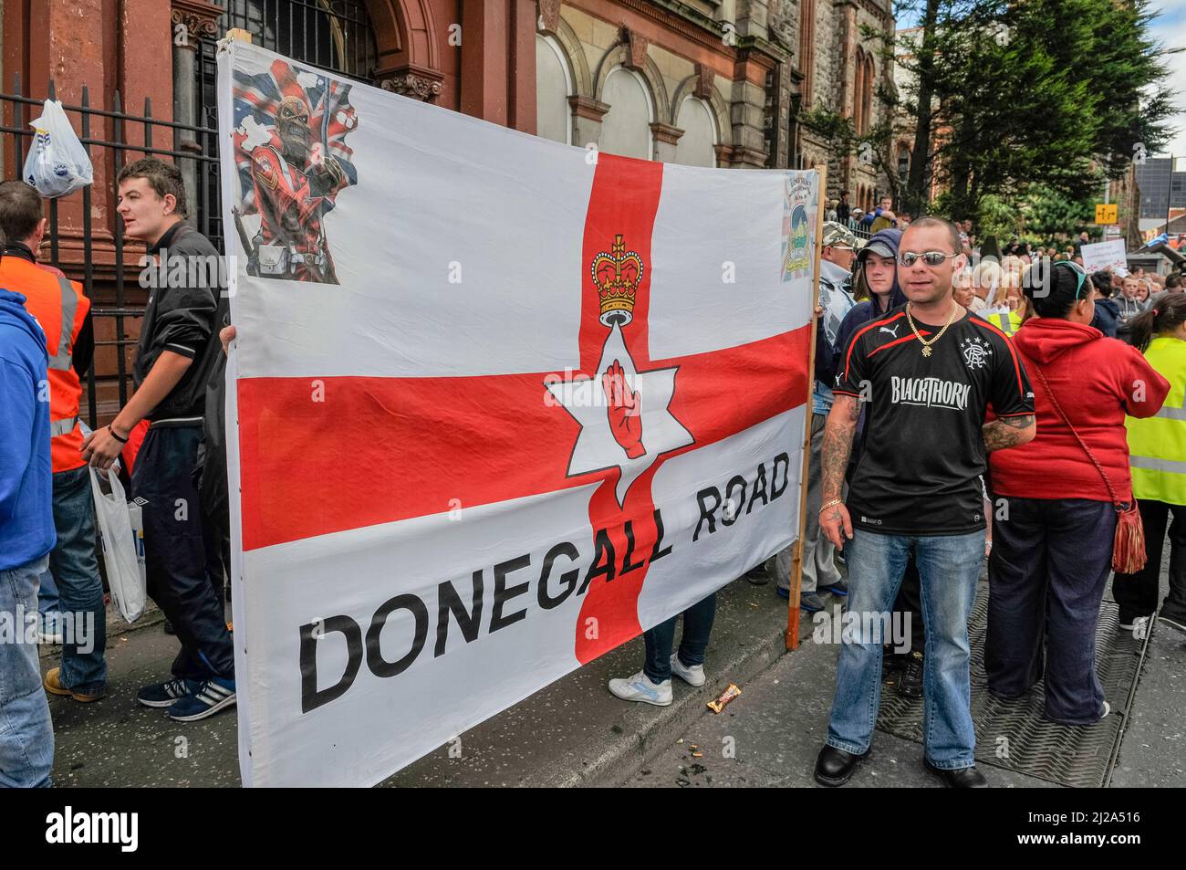 25th August 2013, Belfast - Loyalist protesters gather at the Orange Hall in Clifton Street to protest against a Republican parade to commemorate Henry Joy McCracken. Stock Photo