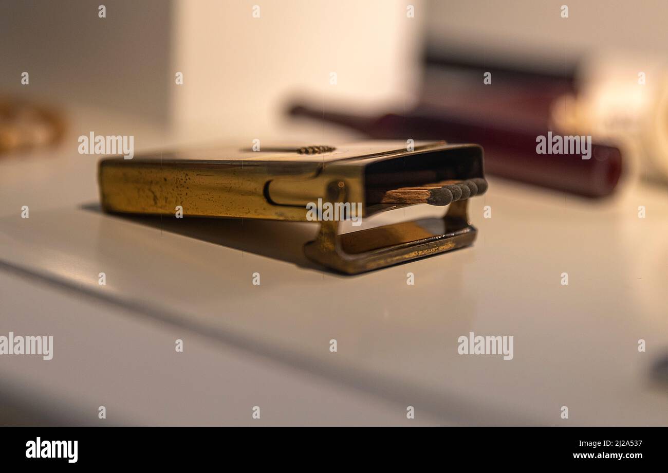 Match holders and a pipe, which are among the personal belongings exhibited in the house where