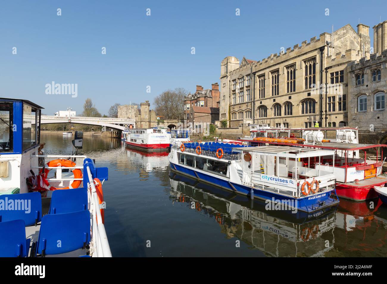 Site seeing cruise on River Ouse, York, with Lendal Bridge Built 1861, in distance. Stock Photo