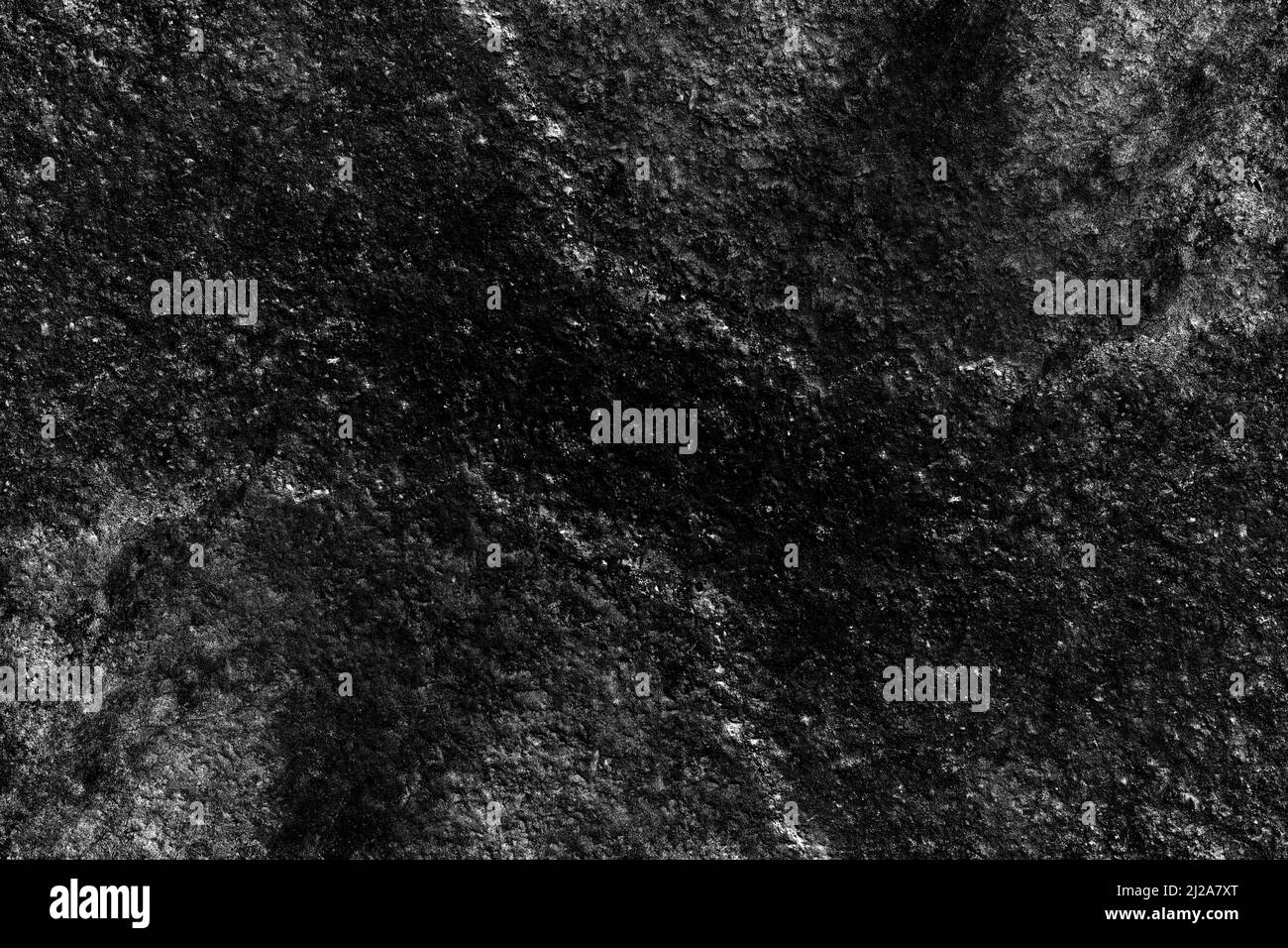 Rugged old stone wall surface with heavy grunge texture Stock Photo - Alamy