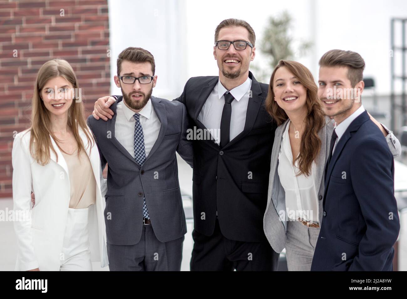 happy business team standing together Stock Photo - Alamy