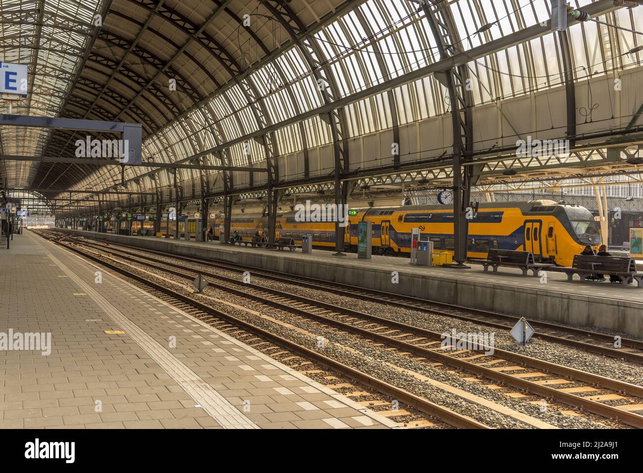 Amsterdam, Netherlands, March 2022. The busy central station in Amsterdam, the Netherlands. High quality photo Stock Photo