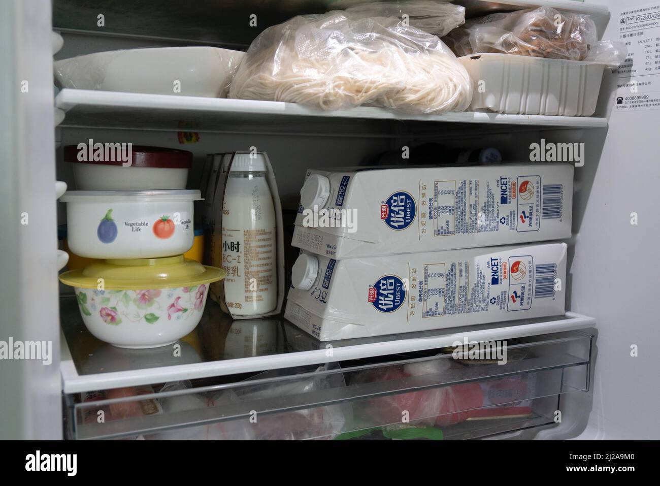 SHANGHAI, CHINA MARCH 31, 2022 A family's refrigerator contains