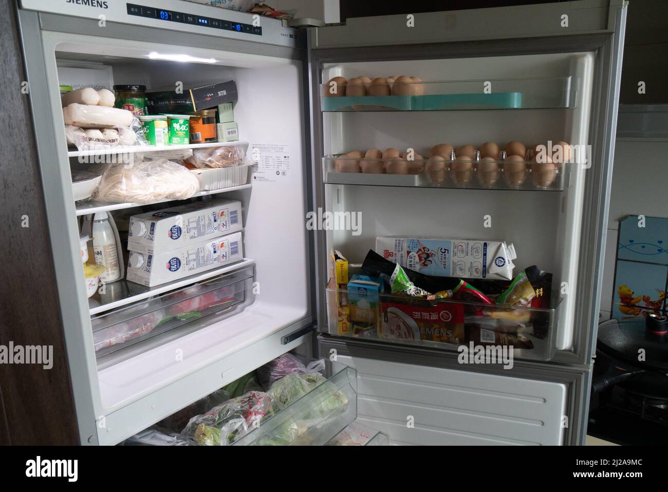 SHANGHAI, CHINA MARCH 31, 2022 A family's refrigerator contains