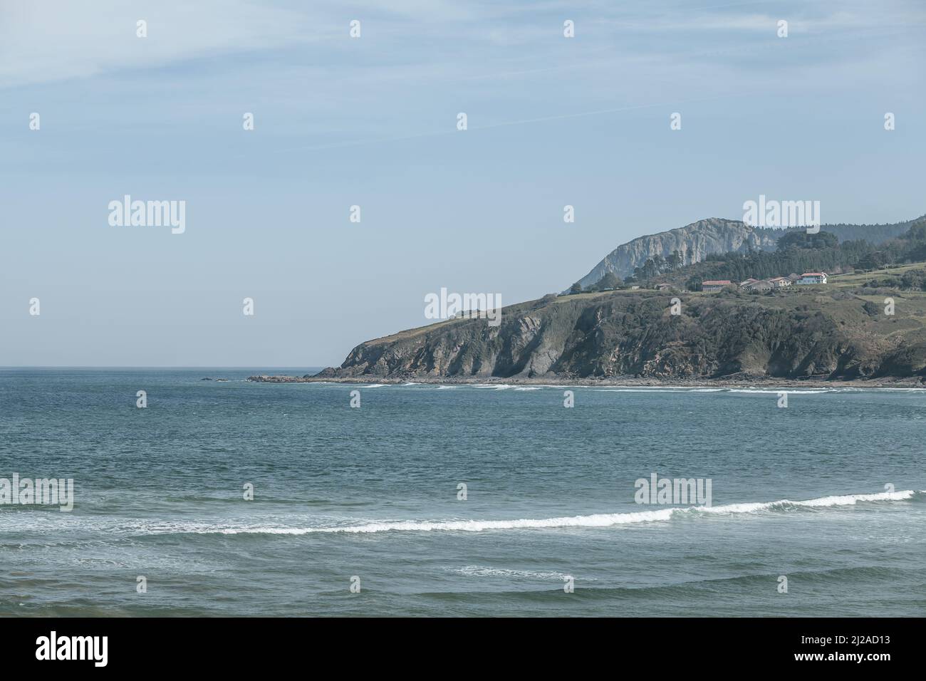 Views of a beautiful landscape in horizontal format of the Urdaibai biosphere reserve, a perfect combination of mountain and beach on a sunny day. Stock Photo