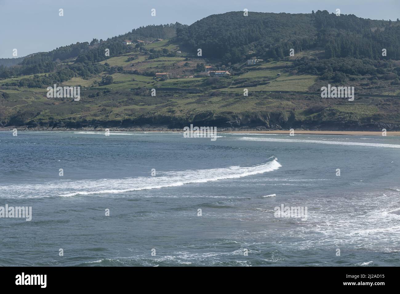 Views of a beautiful landscape in horizontal format of the Urdaibai biosphere reserve, a perfect combination of mountain and beach on a sunny day. Stock Photo