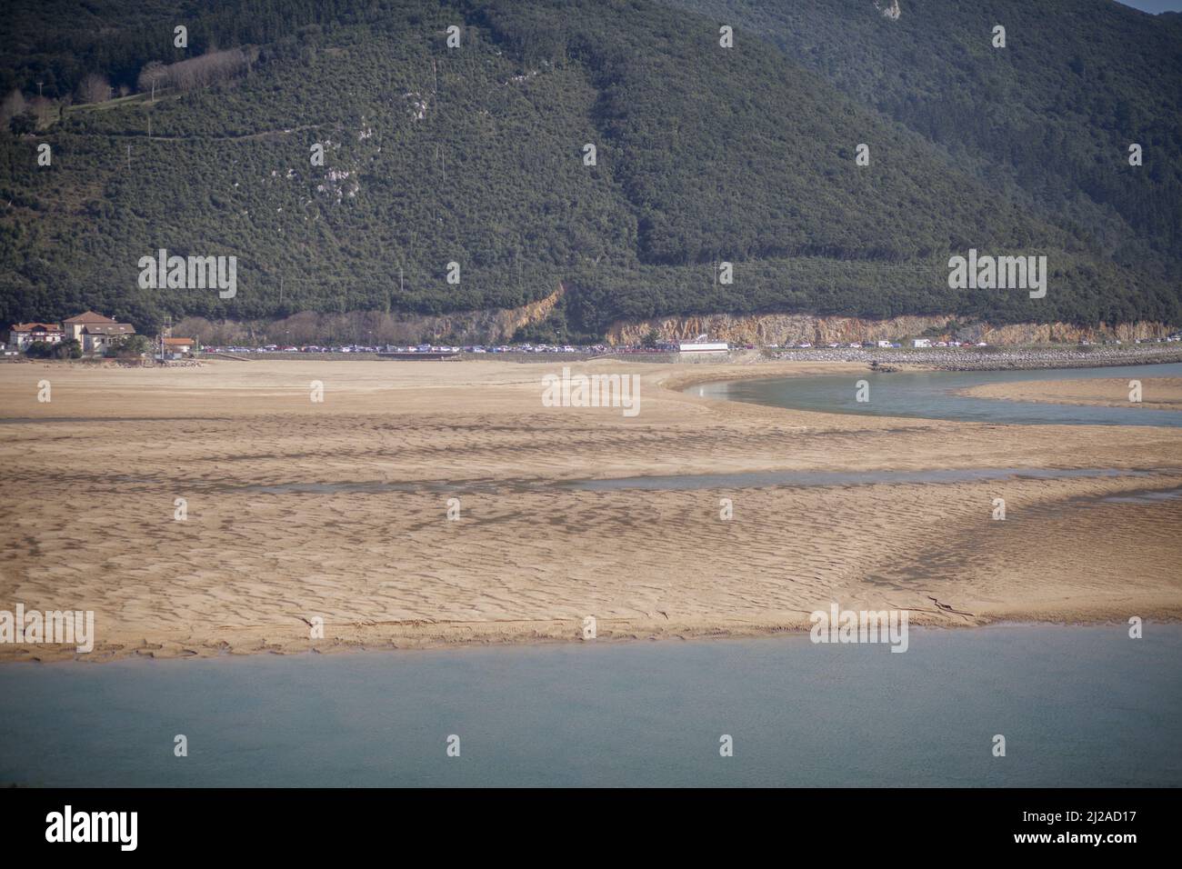 Views of a beautiful landscape in horizontal format of the Urdaibai biosphere reserve, a perfect combination of mountain and beach on a sunny day. Stock Photo