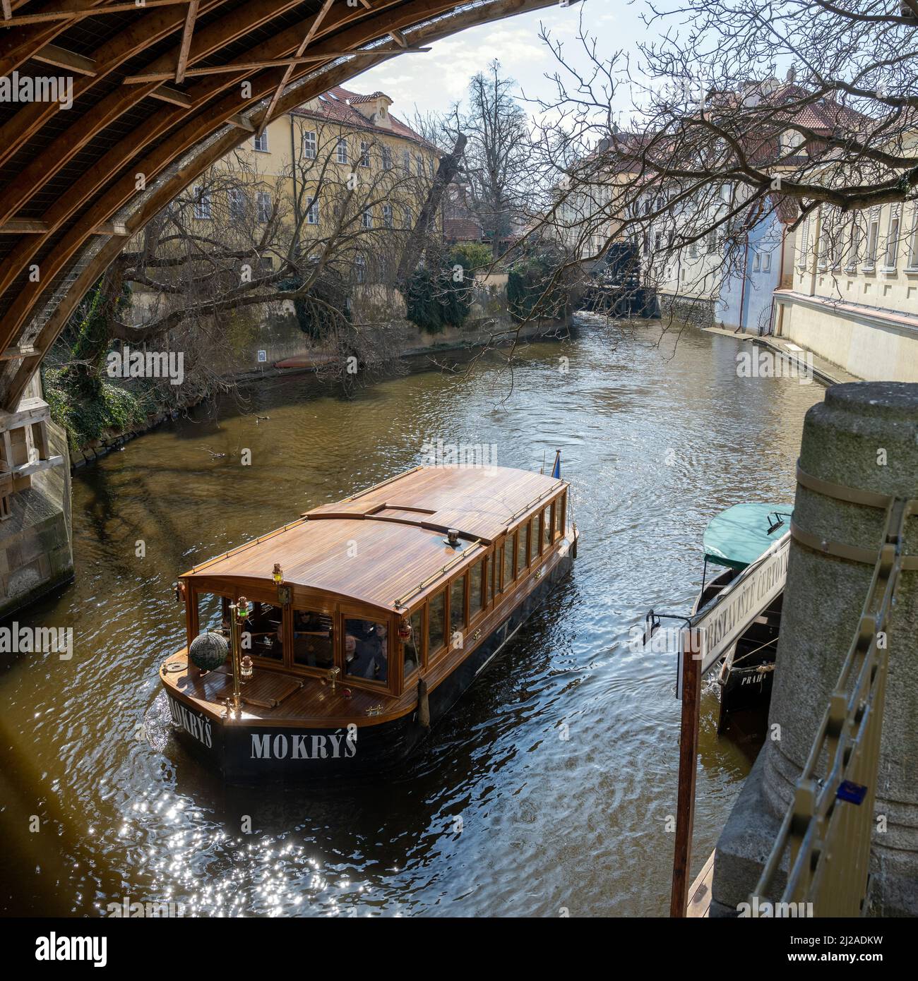 Taking a boat tour around Prague's canals and river Vltava in Prague, Czech Republic. Stock Photo