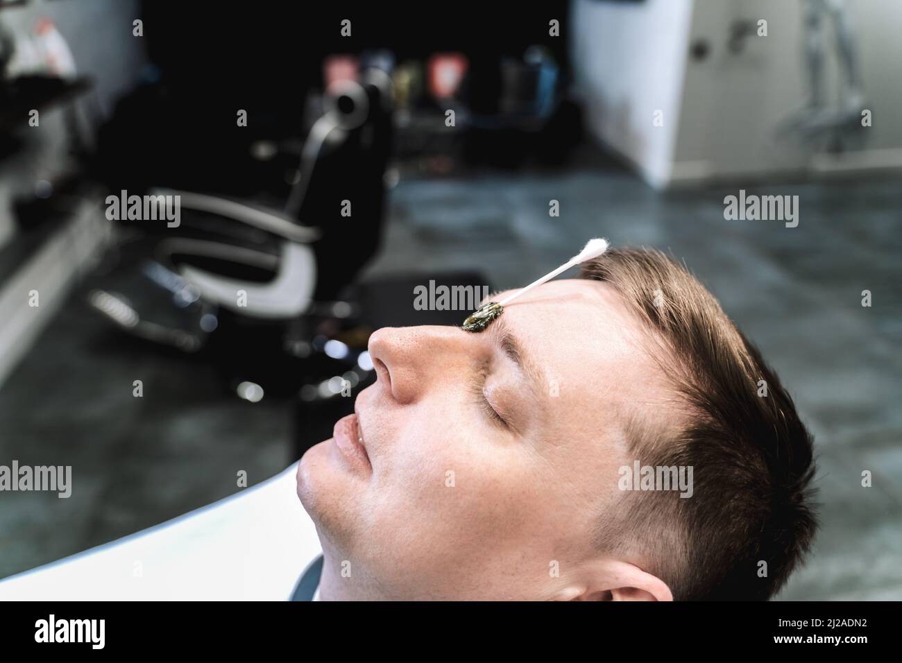 Visit to depilation,hair removal between the eyebrows