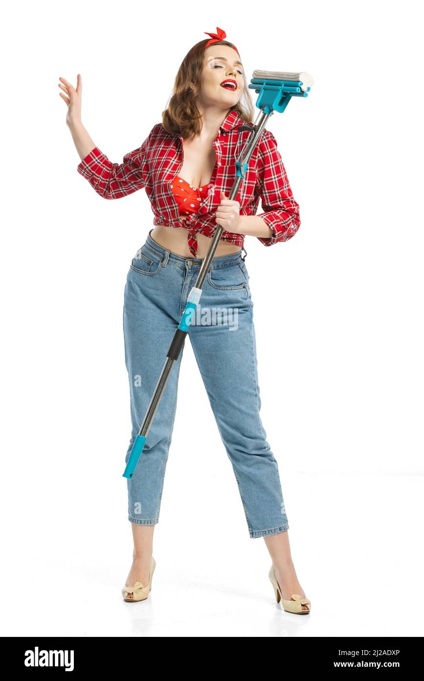 Portrait of young emotional girl, housewife wearing homewear in 70s, 80s  fashion style isolated on white studio background. Emotions, female rights  Stock Photo - Alamy