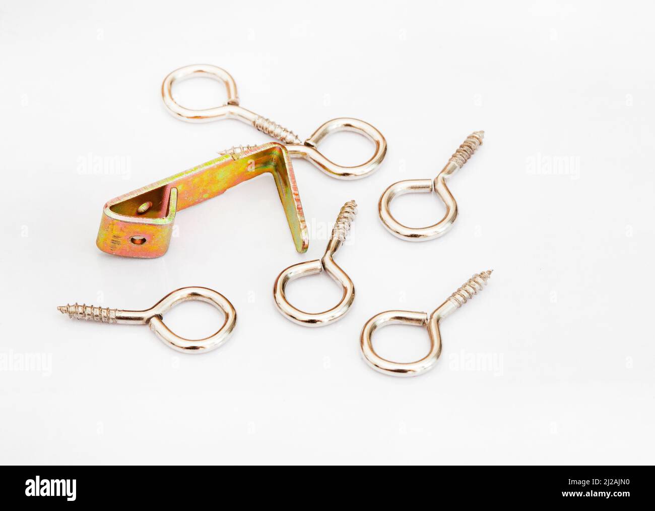 Close up of Picture hanging hooks on white background Stock Photo