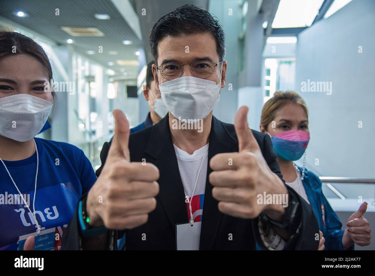 Bangkok, Thailand. 31st Mar, 2022. Candidate for Bangkok governor, Sita Tiwaree, uses his thumbs to flash his electoral number during the Bangkok Governor Registration at Bangkok Metropolitan Administration 2. The eleventh election for the governorship of Bangkok will be held on May 22, 2022 that is the first Bangkok governorship elections in nine years since 2013 after the military seized power in a 2014 coup. Credit: SOPA Images Limited/Alamy Live News Stock Photo