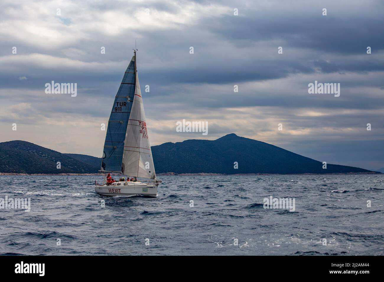 Bodrum, Mugla, Turkey - 02.25.2022: Single Ship yacht with open sails  navigating in Aegean Sea at regatta. Sailboat sail in windy grey weather. Team  Stock Photo - Alamy