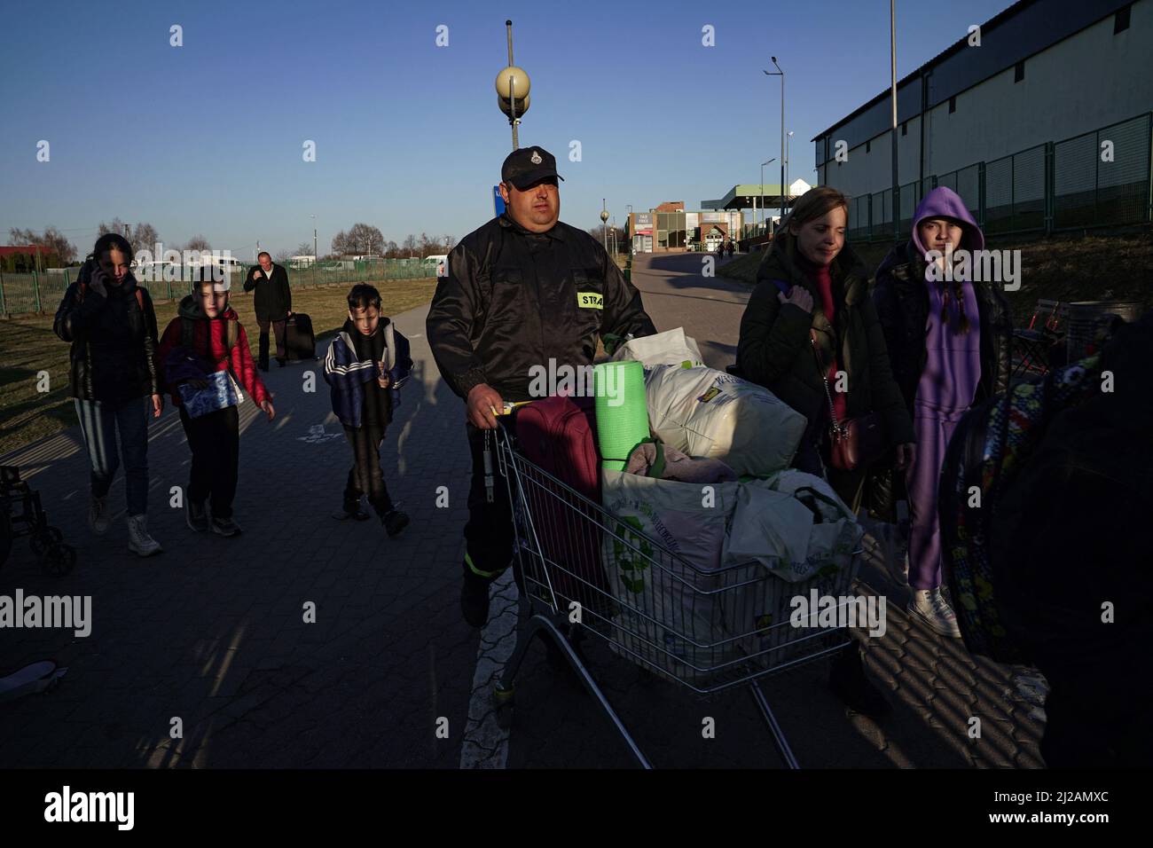 Ukrainian refugees fleeing the Russian invasion are pictured at the