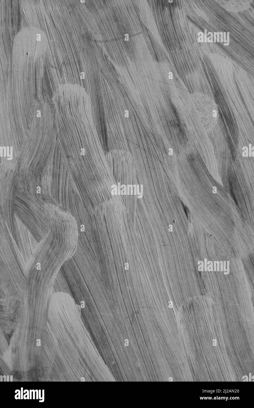 Messy brushwork streaking gray paint across the window Stock Photo Alamy