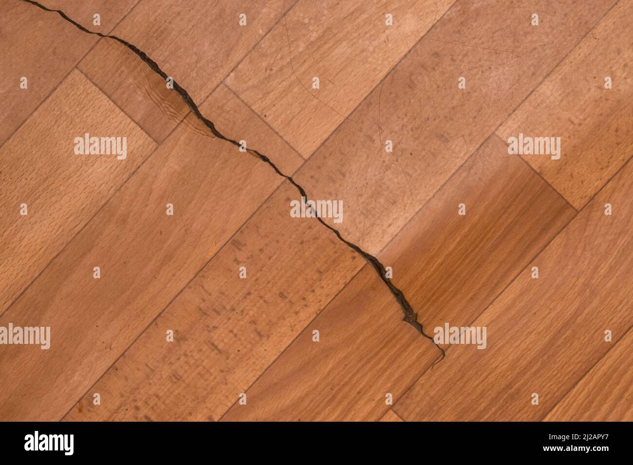 Broken torn linoleum old rubber PVC floor damage material, flooring