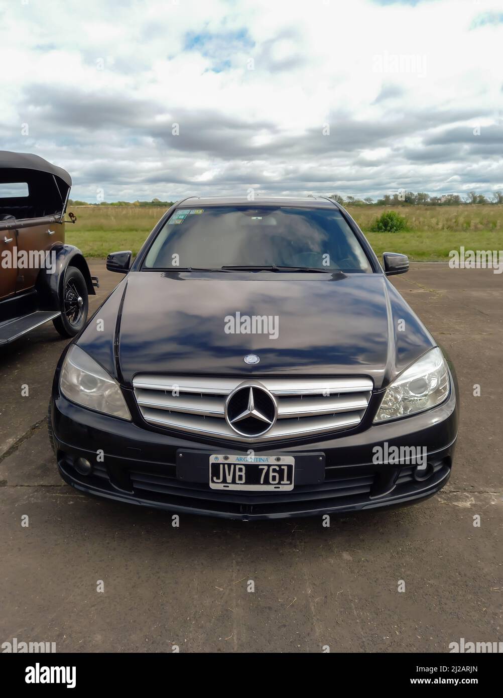 Executive luxury black German Mercedes Benz C200 CGI saloon sedan four door  2010-2015. Front view. CADEAA 2022 MNA Classic car show Stock Photo - Alamy