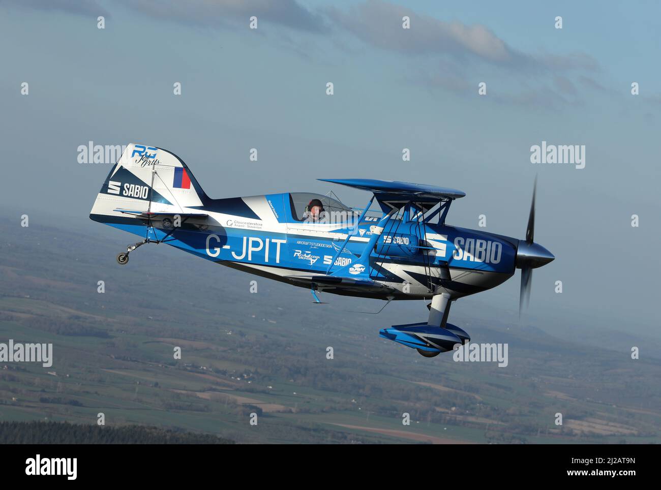 Air to Air image of Rich Goodwin in his Jet Pitts which has 2 jet engines as well as a piston engine. Stock Photo