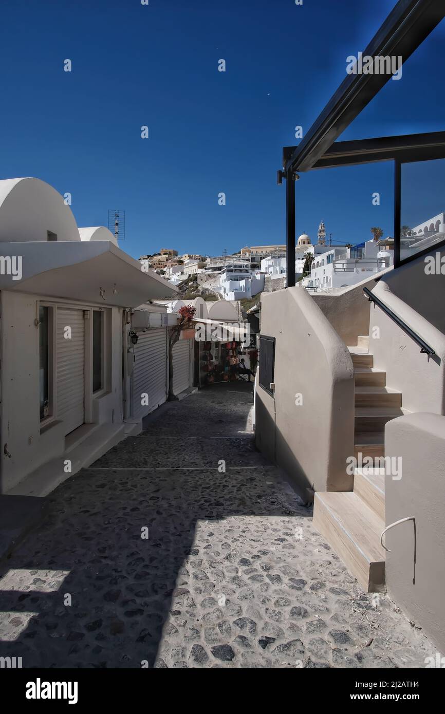 Santorini, Greece - May 10, 2021 : View of closed shops in the center of Fira Santorini during Covid restrictions Stock Photo