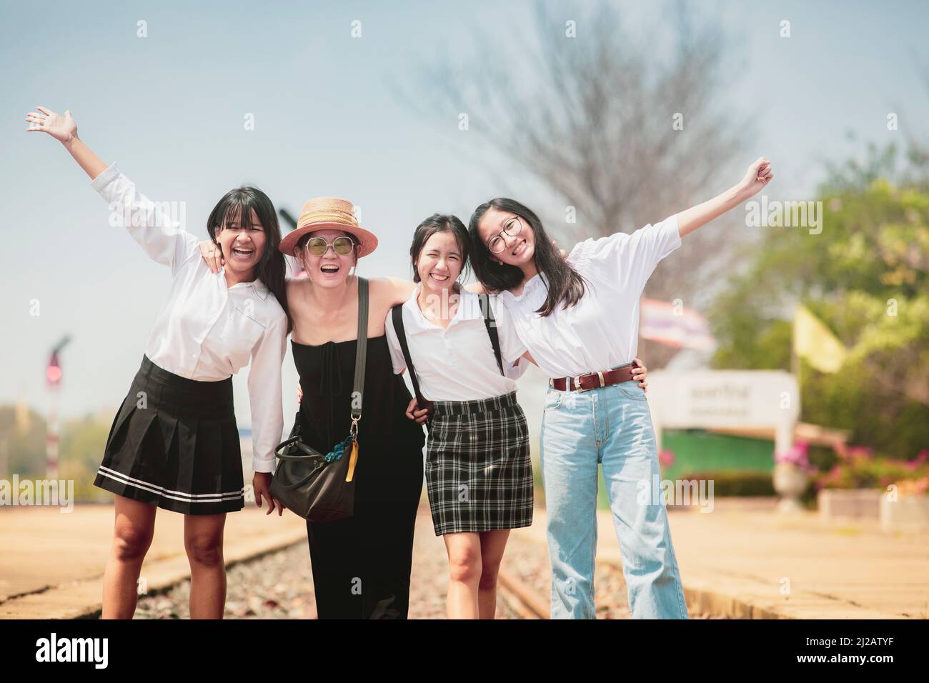 group of asian woman happiness face standing outdoor Stock Photo