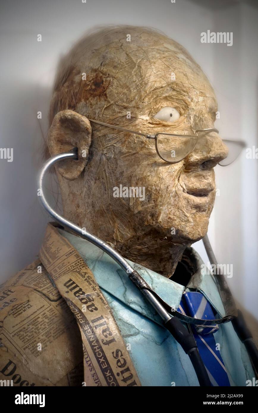 papier mache sculpture of doctor with stethascope Stock Photo