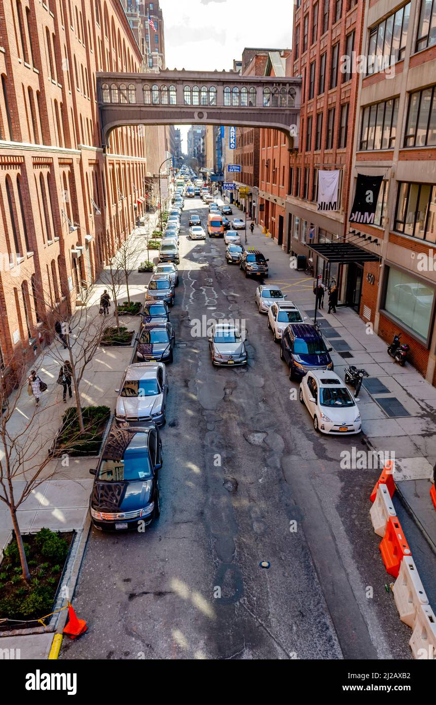 City street with lots of parked Cars in Chelsea, New York City, aerial ...