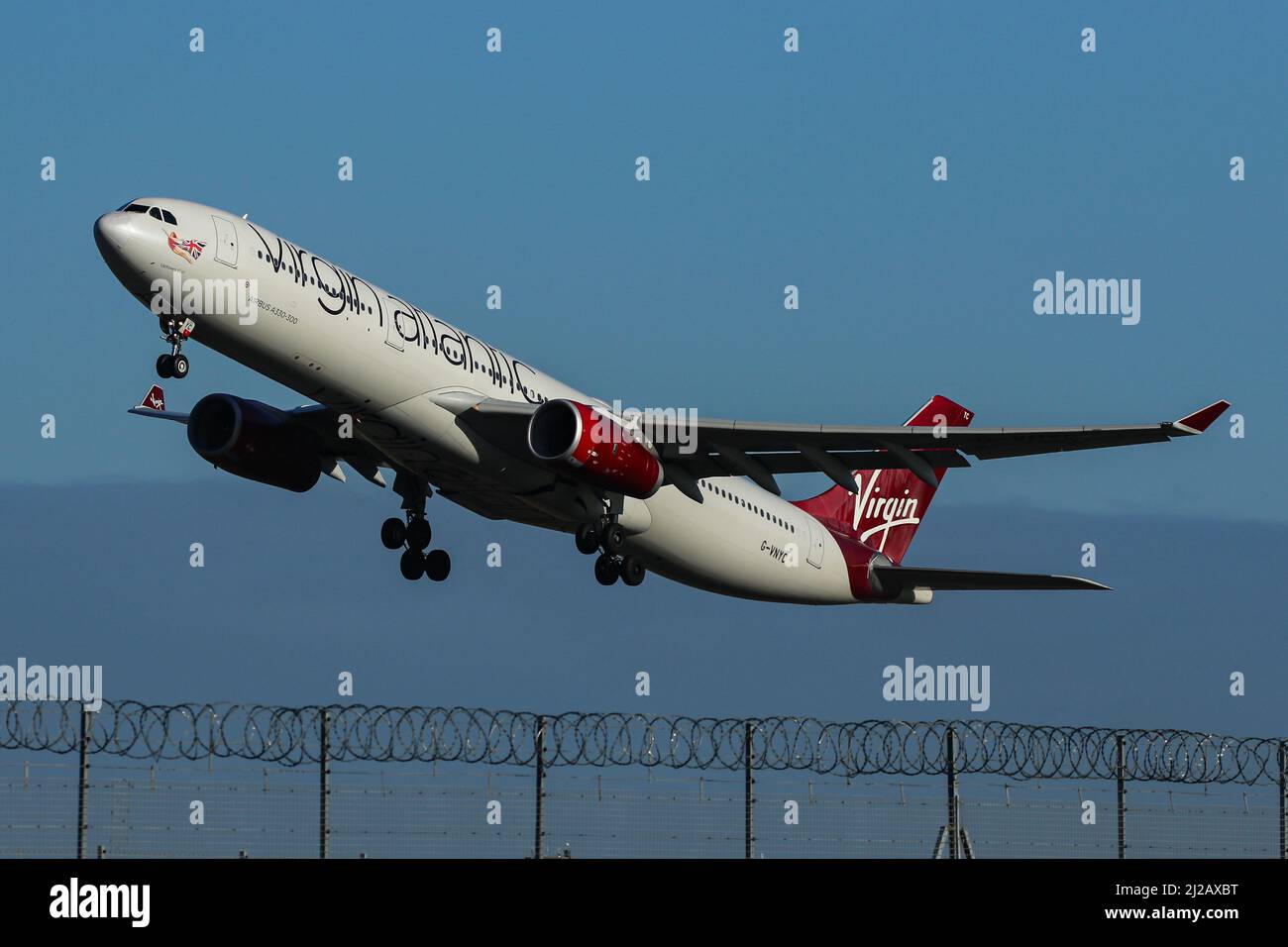 An Airbus A330 operated by Virgin Atlantic departs from London Heathrow Airport Stock Photo