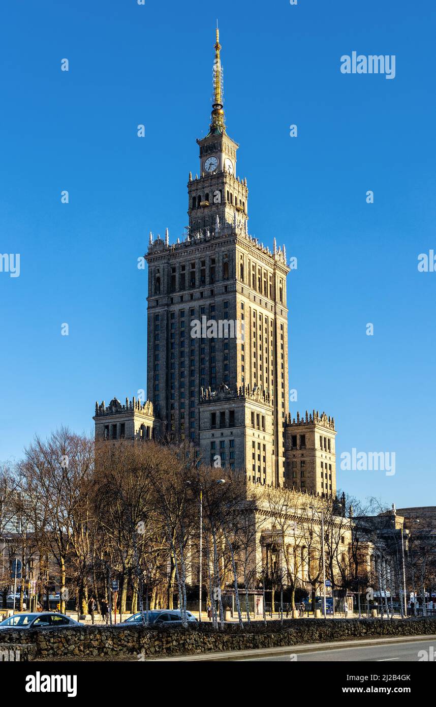 Warsaw, Poland - March 18, 2022: Culture and Science Palace - Palac Kultury - at Plac Defilad square and Emilii Plater street in Srodmiescie downtown Stock Photo
