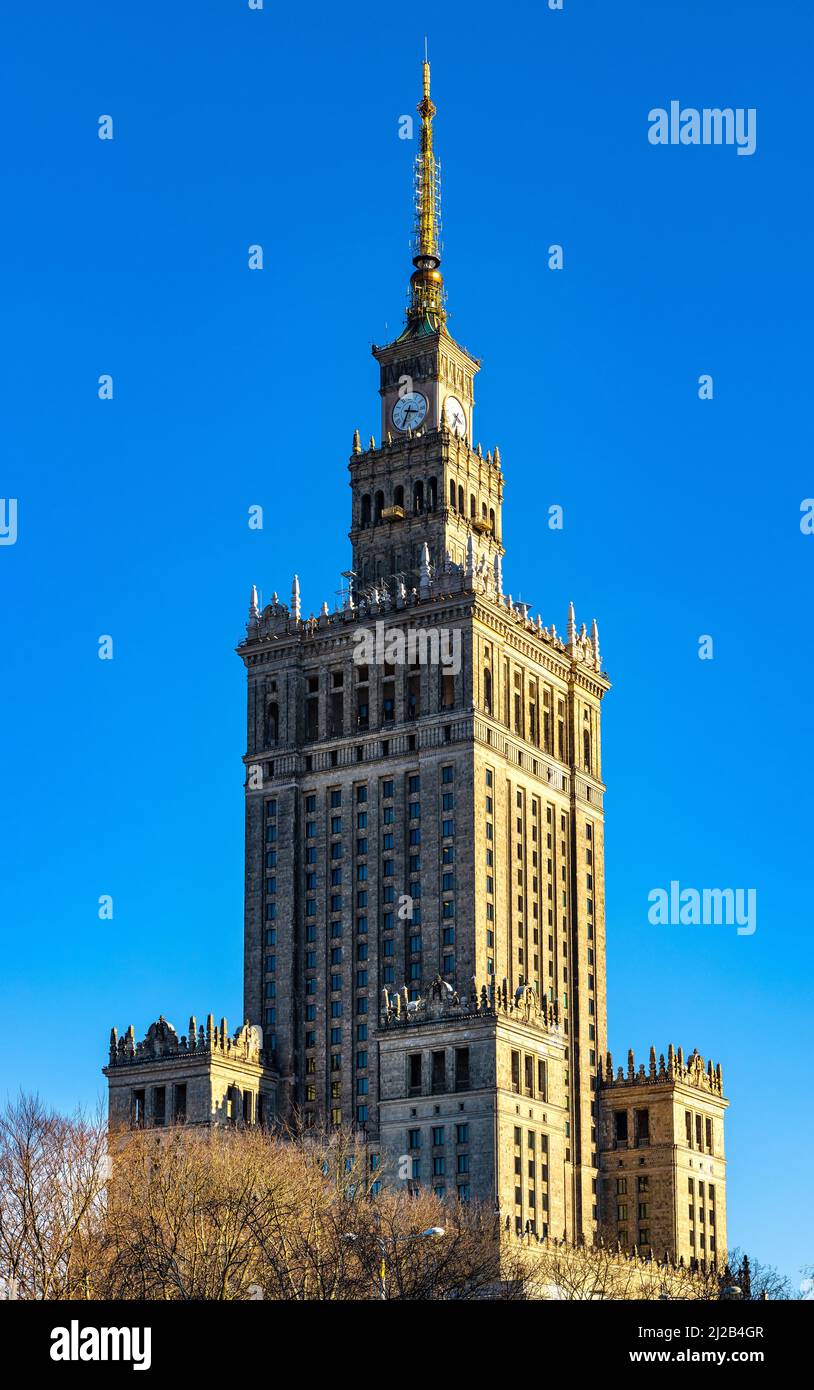 Warsaw, Poland - March 18, 2022: Culture and Science Palace - Palac Kultury - at Plac Defilad square and Emilii Plater street in Srodmiescie downtown Stock Photo