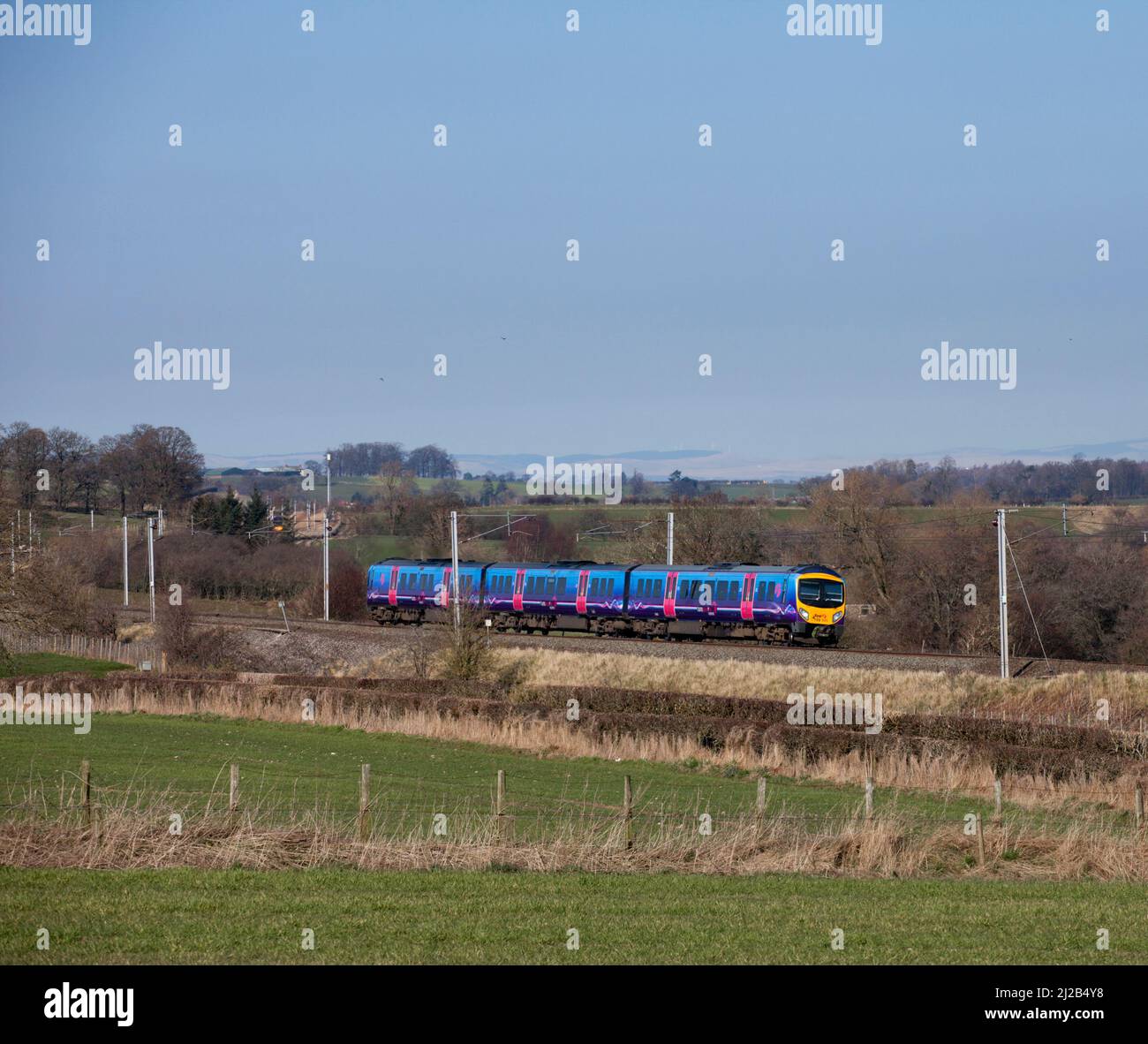 First Transpennine Express class 185 diesel multiple unit 185109 on the electrified west coast mainline in Cumbria Stock Photo