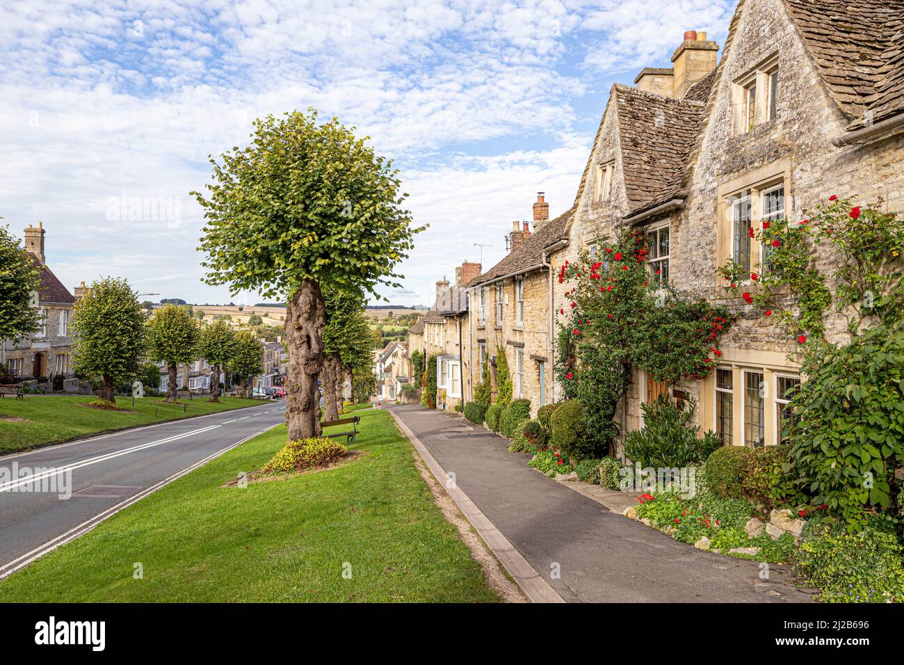 Typical traditional stone buildings on The Hill in the Cotswold town of Burford, Oxfordshire, England UK Stock Photo