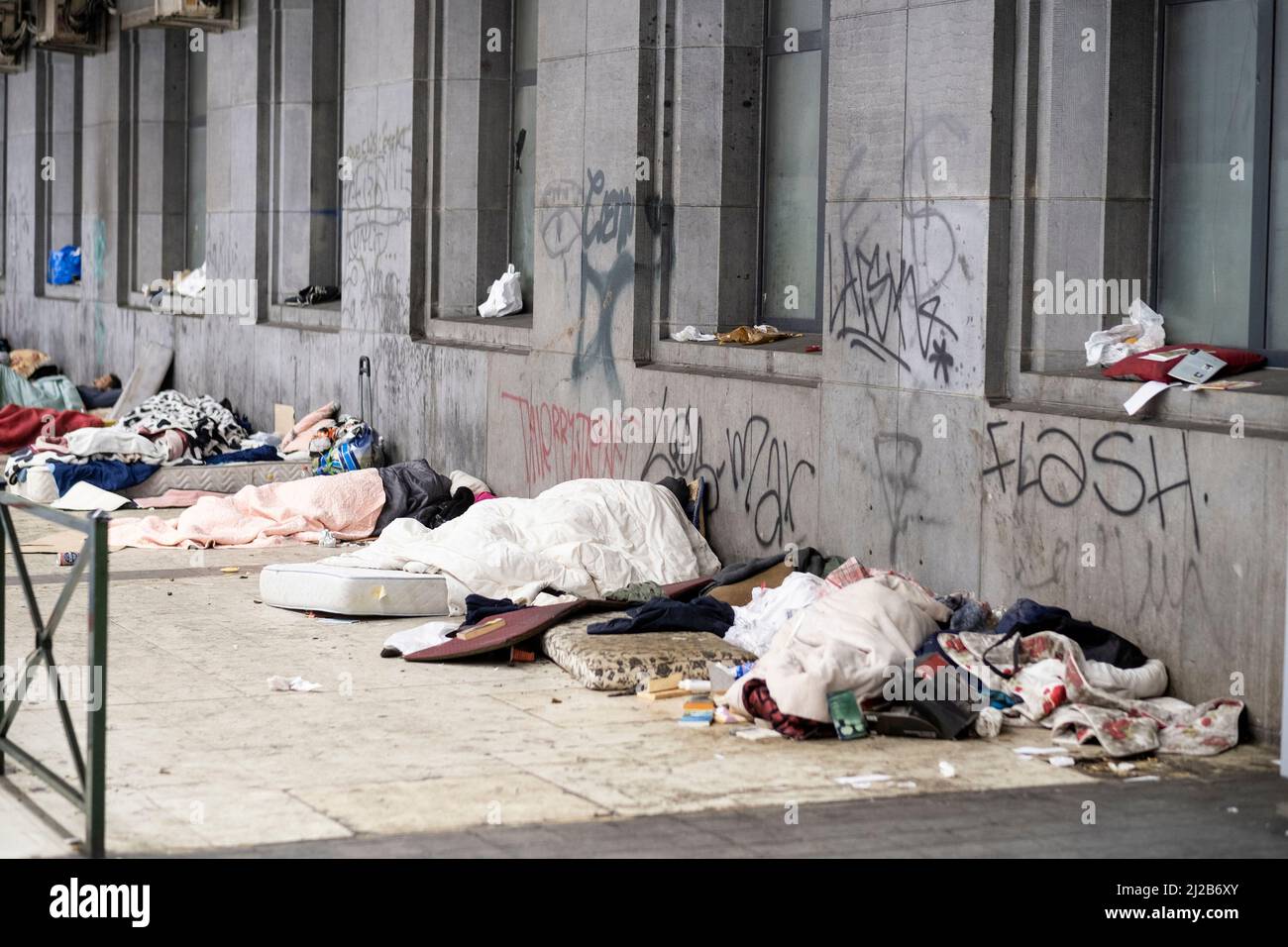 Homeless persons sleeping under a bridge close to the Brussels-South railway station, Belgium Stock Photo