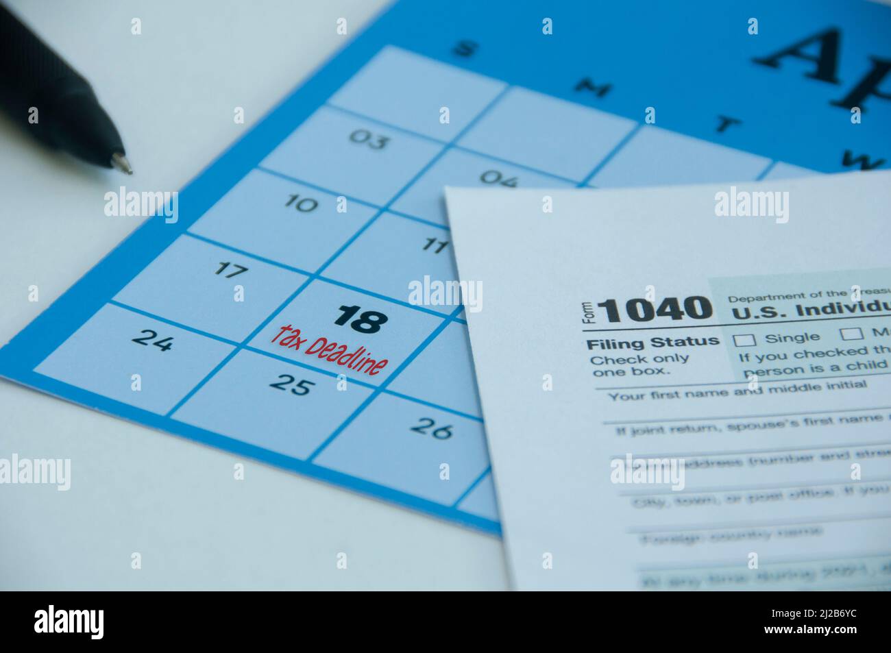 Tax deadline text on April calendar Tax submission due date Stock
